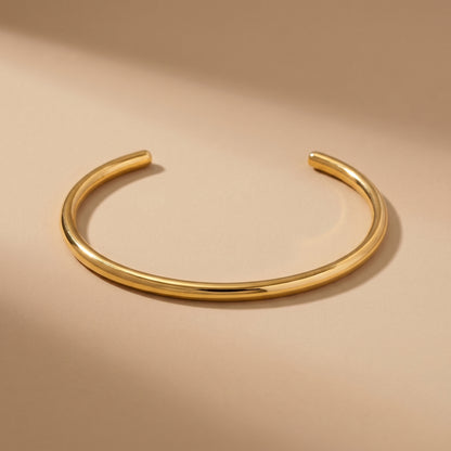 High quality Aura Minimalist Cuff Bangle by Floravisha on a beige background