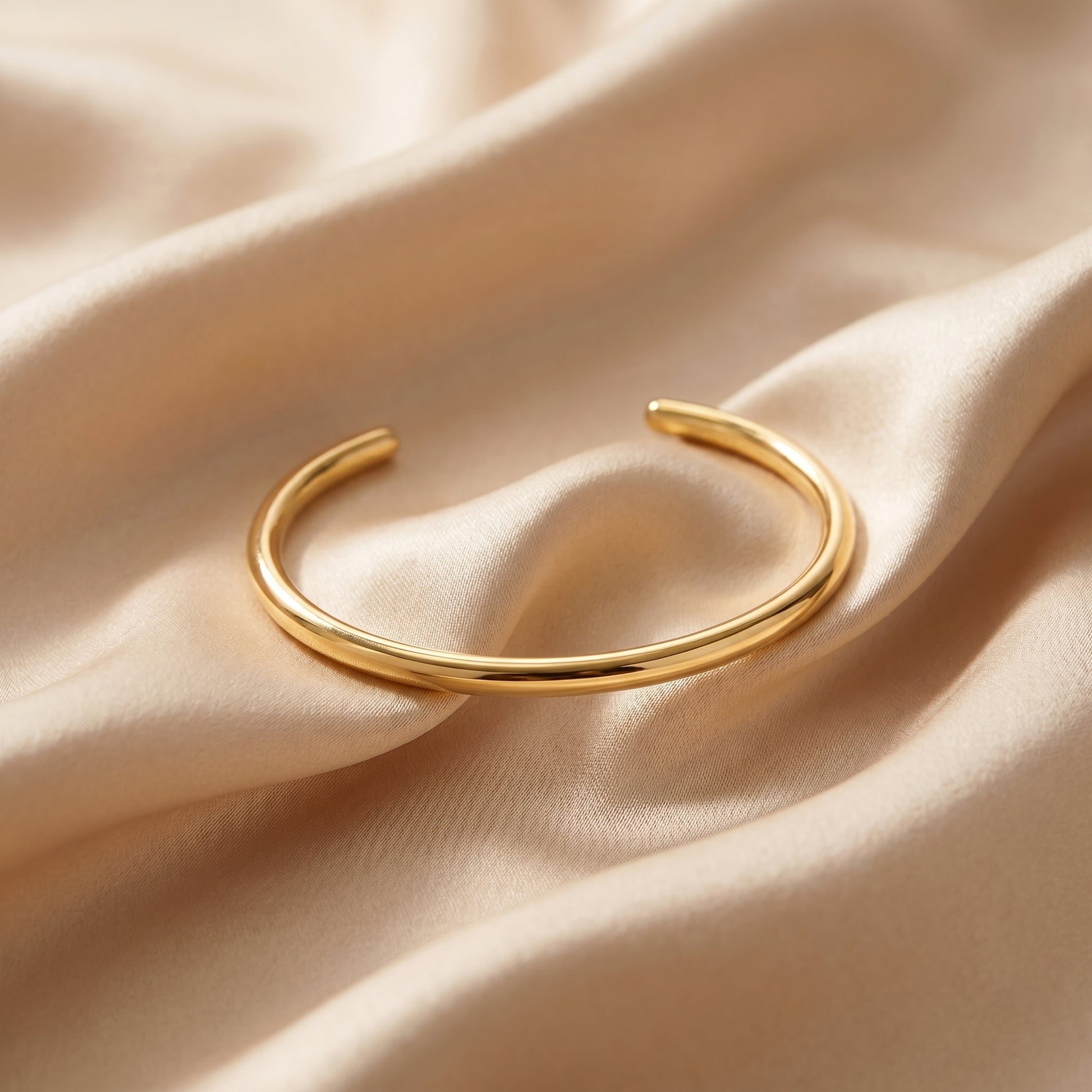 High quality Aura Minimalist Cuff Bangle by Floravisha on a beige fabric background