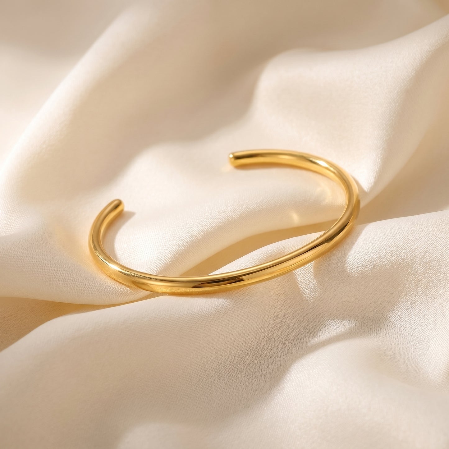 High quality Aura Minimalist Cuff Bangle by Floravisha on a soft beige fabric background