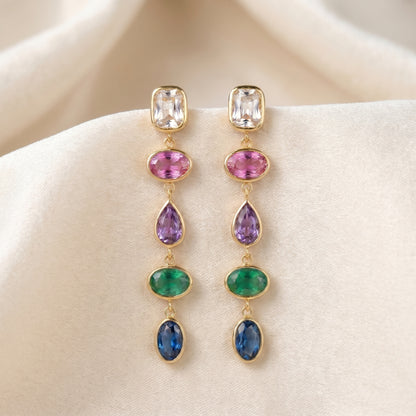 High quality waterproof gold plated cascading drop earrings featuring vibrant multi-color gemstones in champagne, ruby, amethyst, emerald, and sapphire, set against a pristine background.