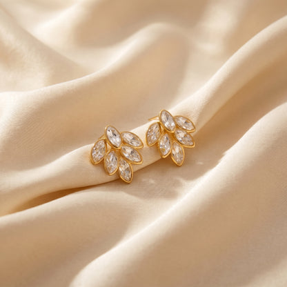 High quality waterproof gold plated stud earrings featuring a modern fan design with clear marquise-cut crystals.
