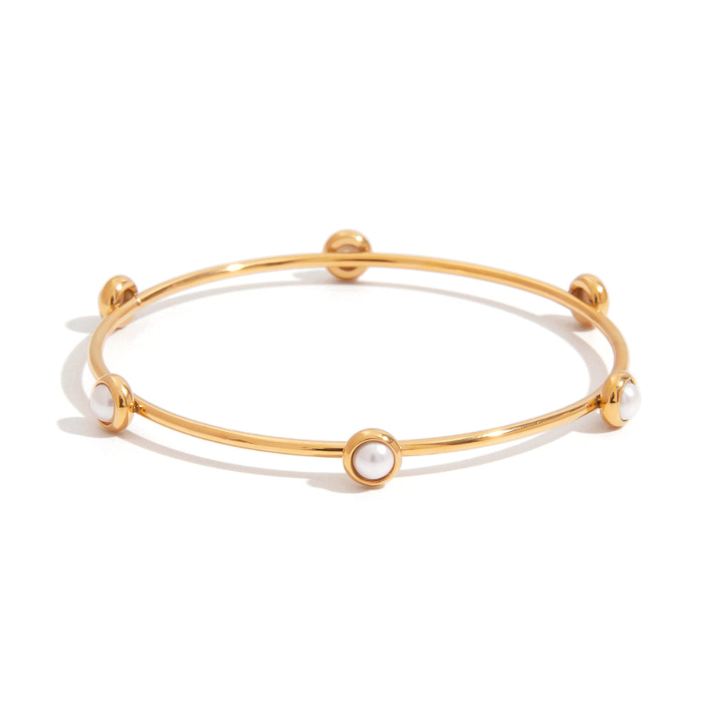 Gold bracelet with pearl-like beads
