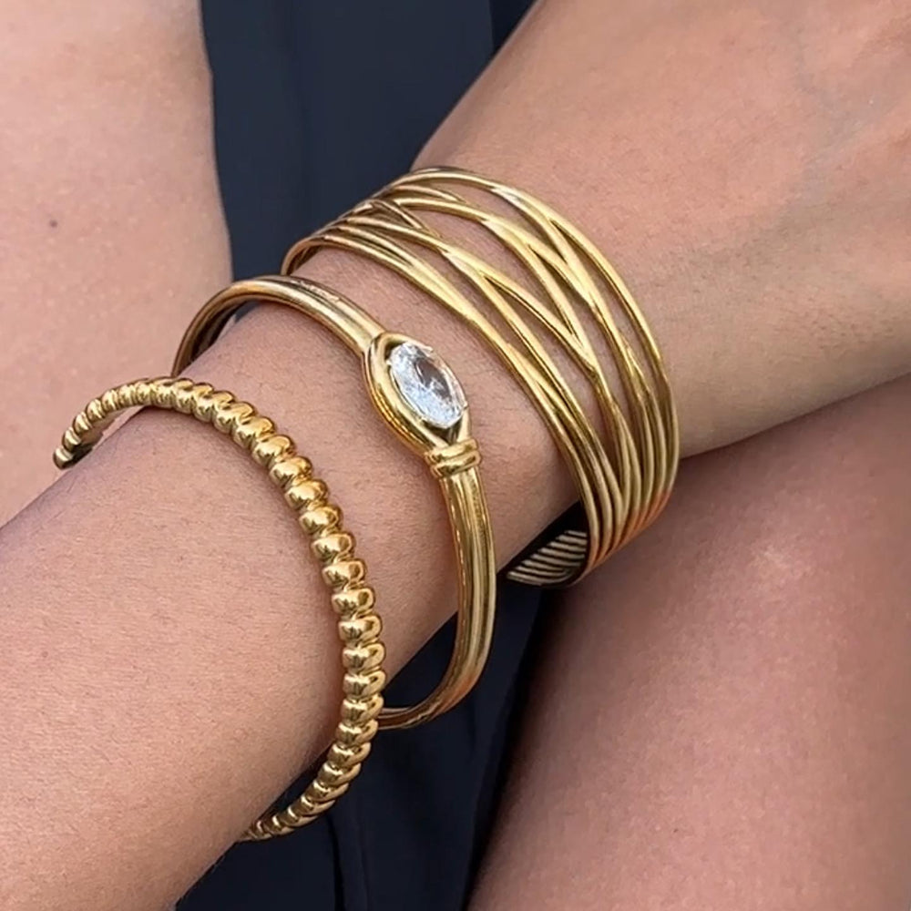Gold bracelets.