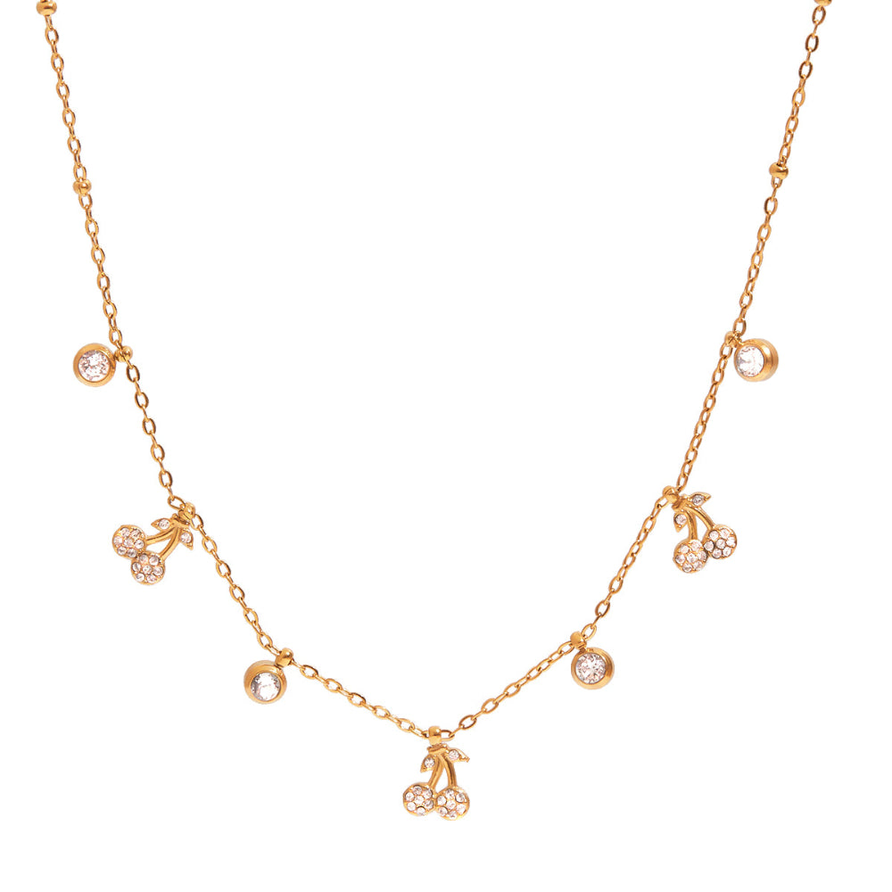 Gold necklace with cherry and gemstone pendants.