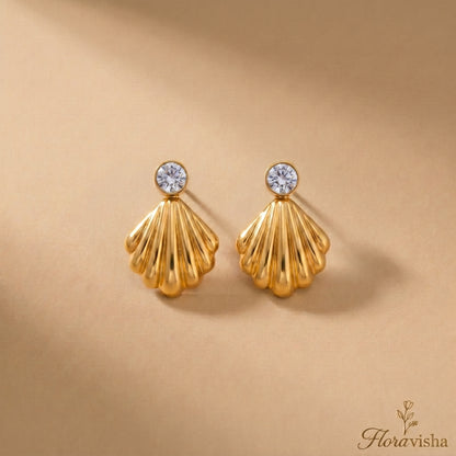 Waterproof gold-plated scallop shell drop earrings featuring a brilliant crystal stud by Floravisha. Displayed on a clean background highlighting the high-quality, skin-friendly jewelry design.